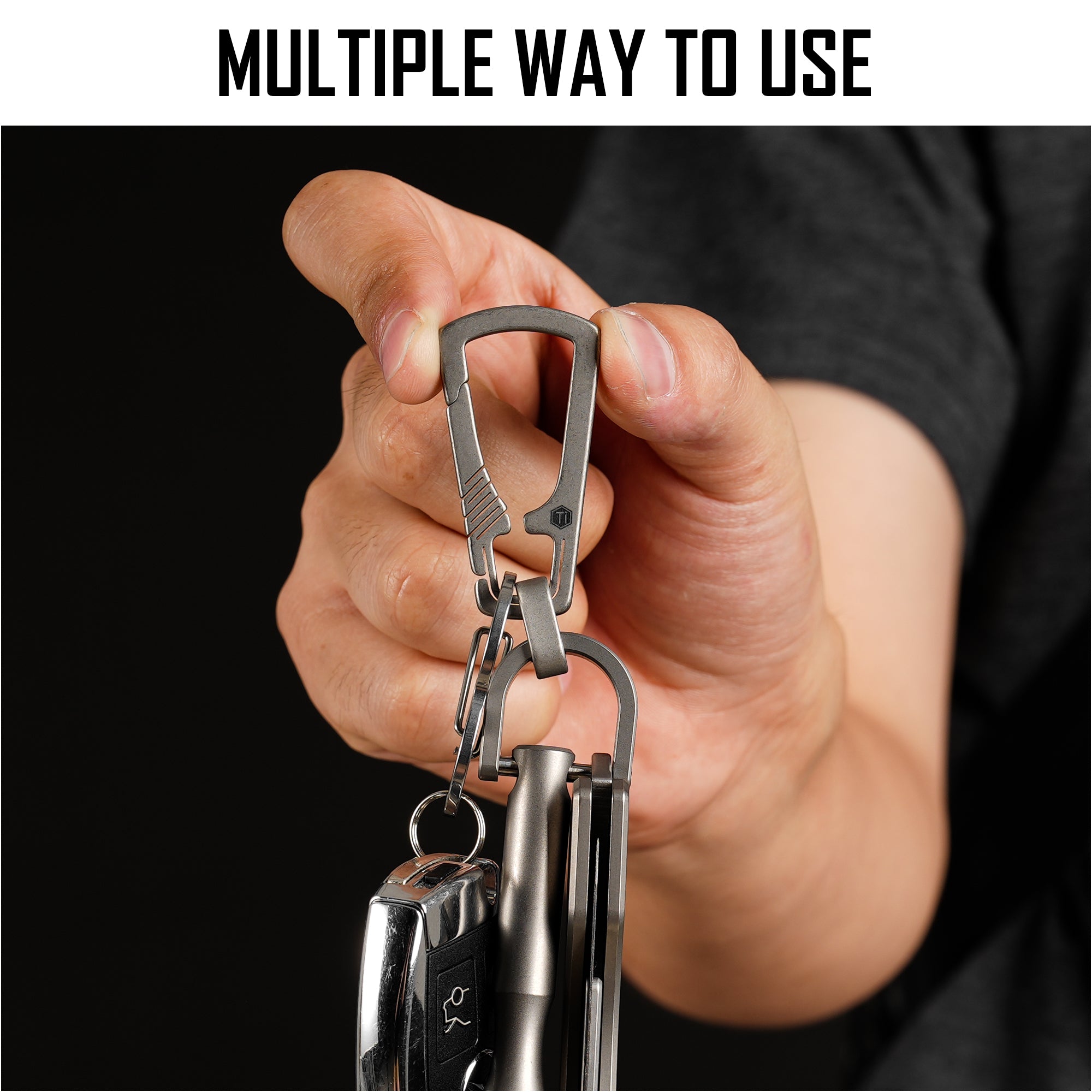 KM17 carabiner clip held with keys in a hand
