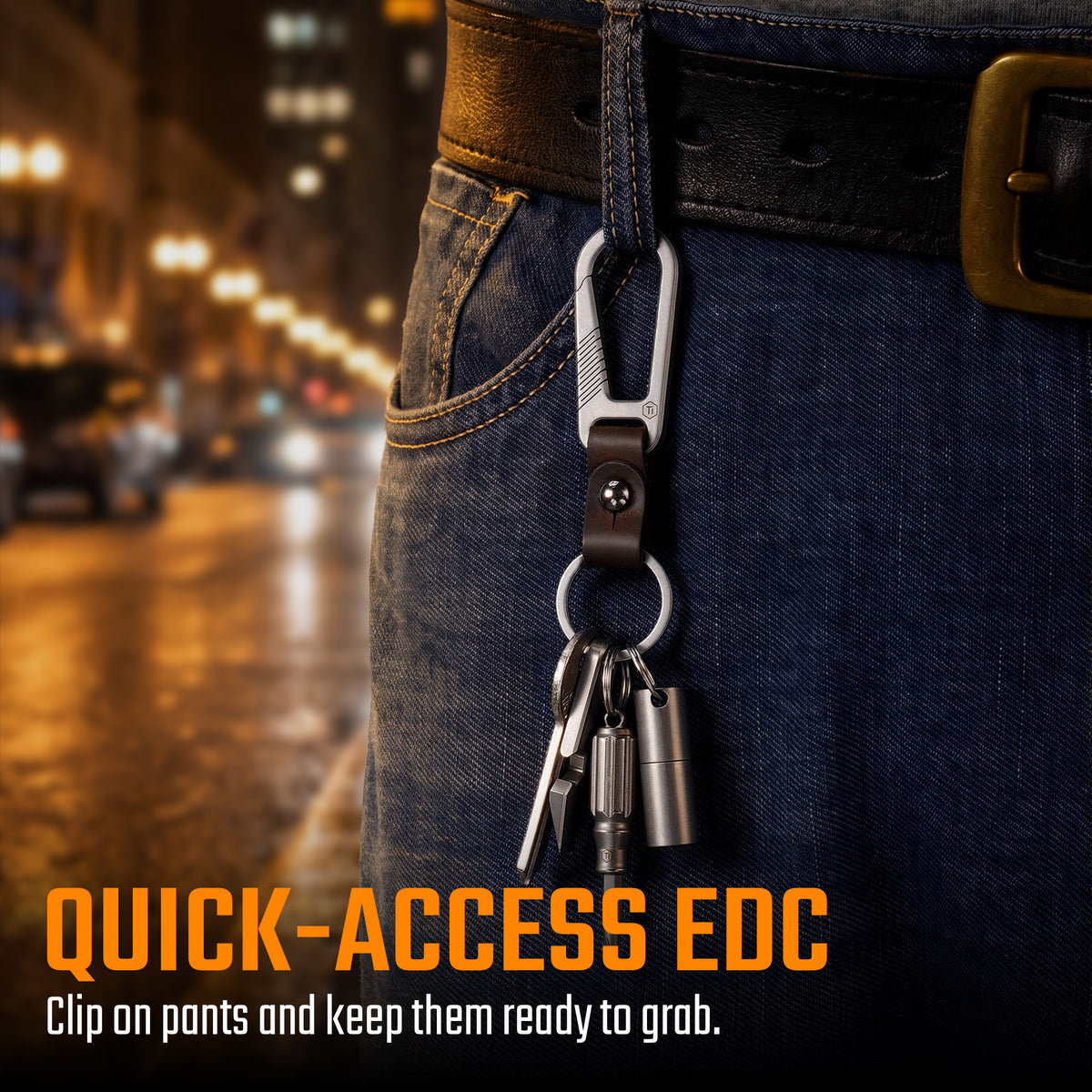 KM27C titanium carabiner keychain clipped to a belt loop with keys and EDC gear