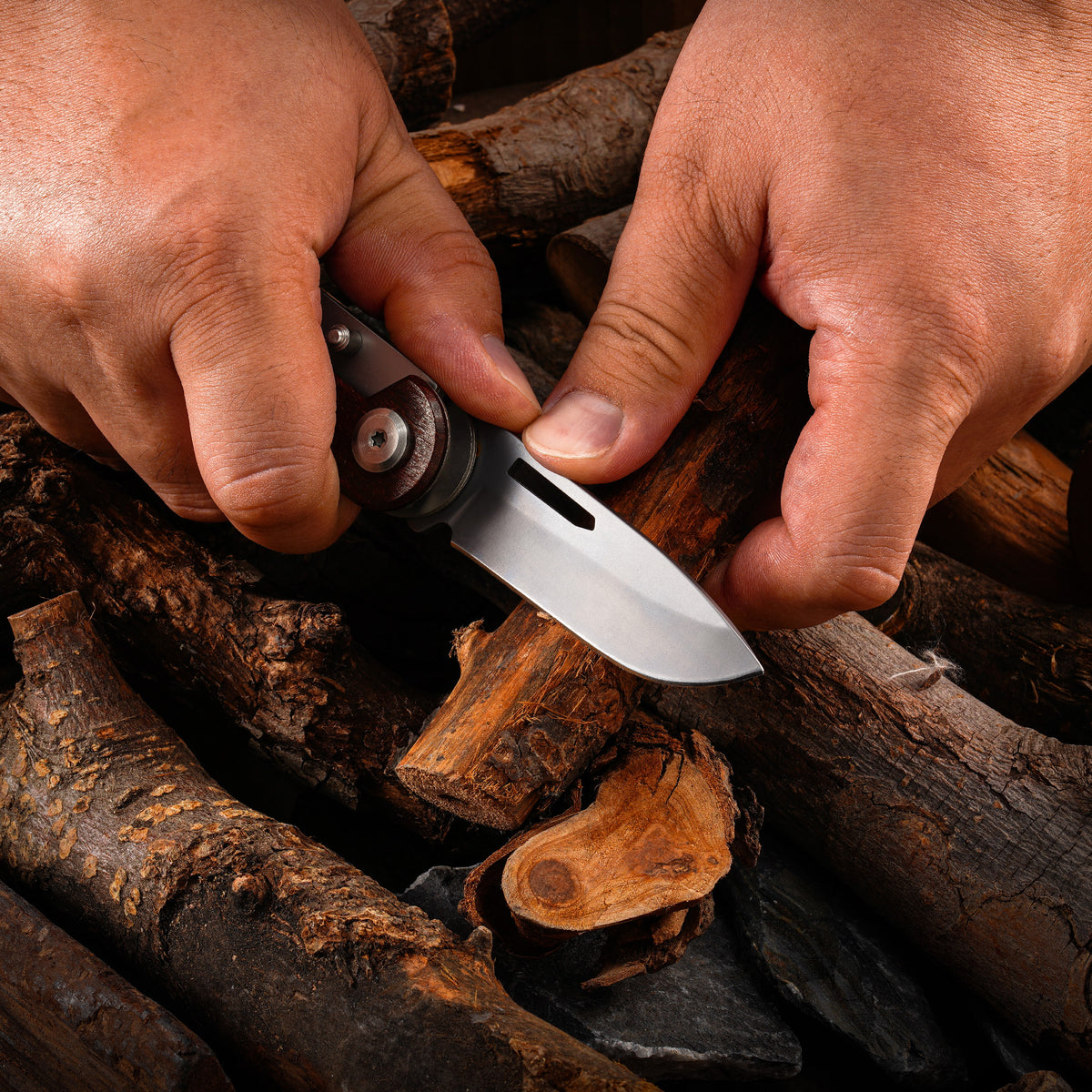 folding knife showing the inner tab used to fold the blade into the handle